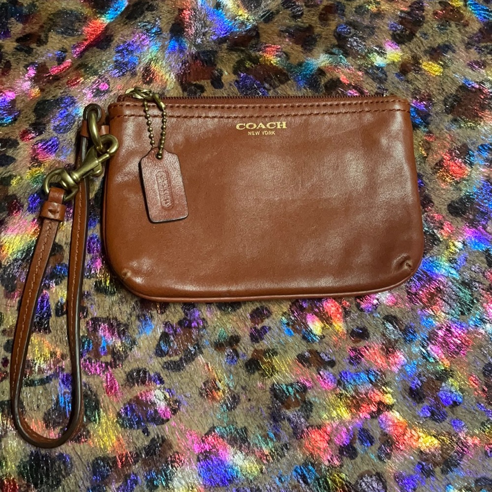 Deep brown leather Coach wristlet